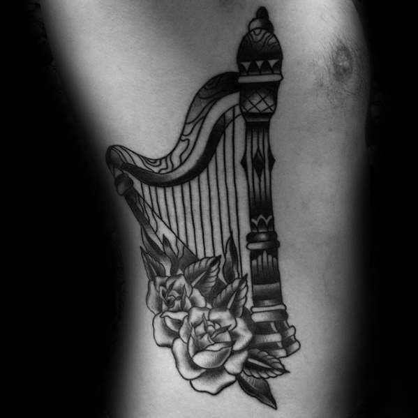 Harfe tattoo 75