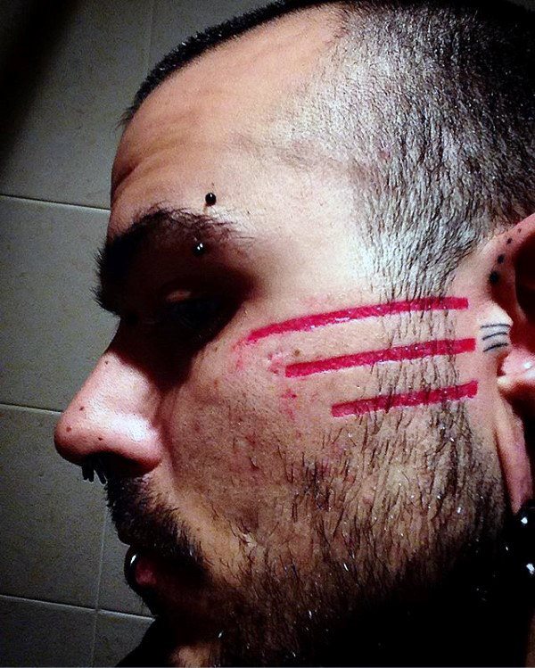 gesichts tattoo 693