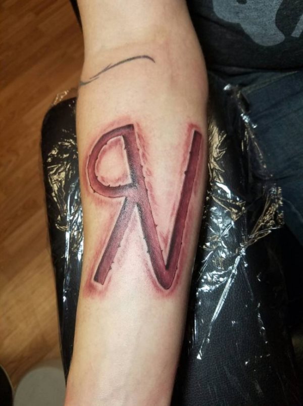 initialen tattoo 34