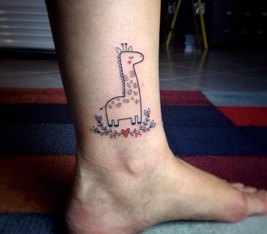 tatouage girafe 56