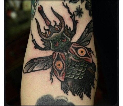 tatouage scarabee 62