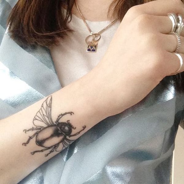 tatouage scarabee 82
