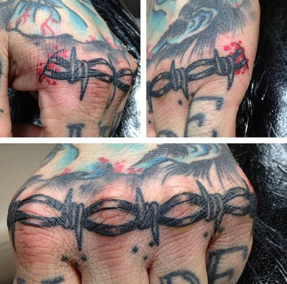 tatouage fil de fer barbele 109