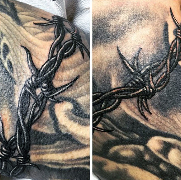 tatouage fil de fer barbele 85