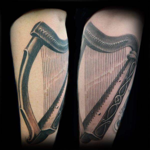 tatouage harpe 111
