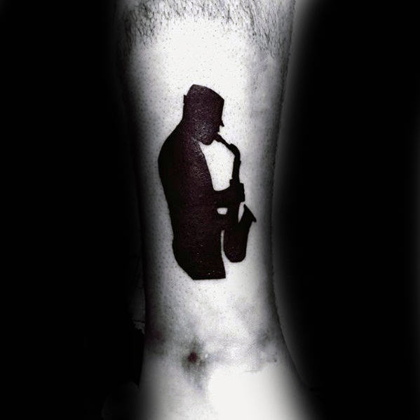 tatouage saxophone 55