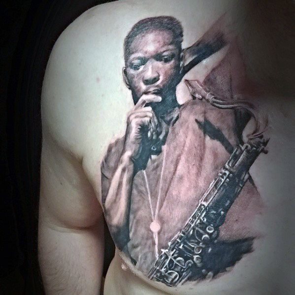 tatouage saxophone 93