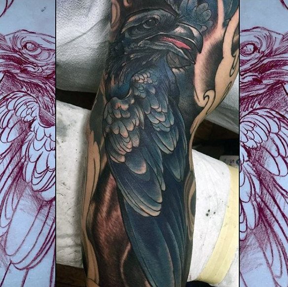 tatouage corbeau 38