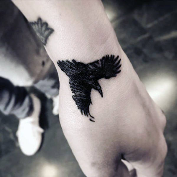 tatouage corbeau 418
