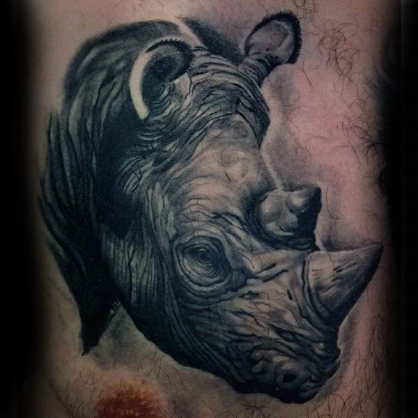 tatouage rhinoceros 83