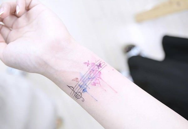 tatouage musique 186