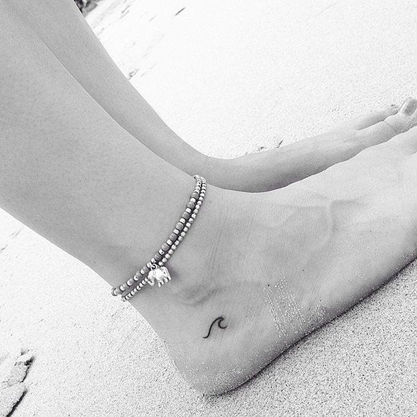 tatouage pied 320