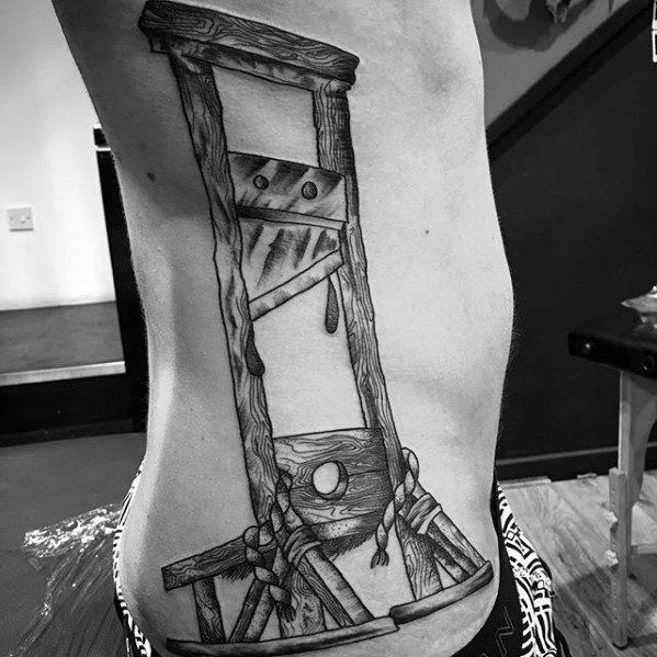 tatouage guillotine 35