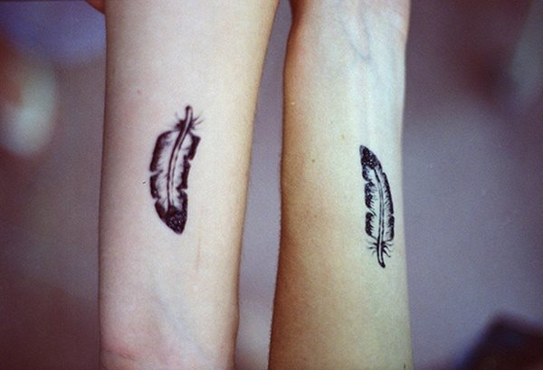 tatouage plume 106