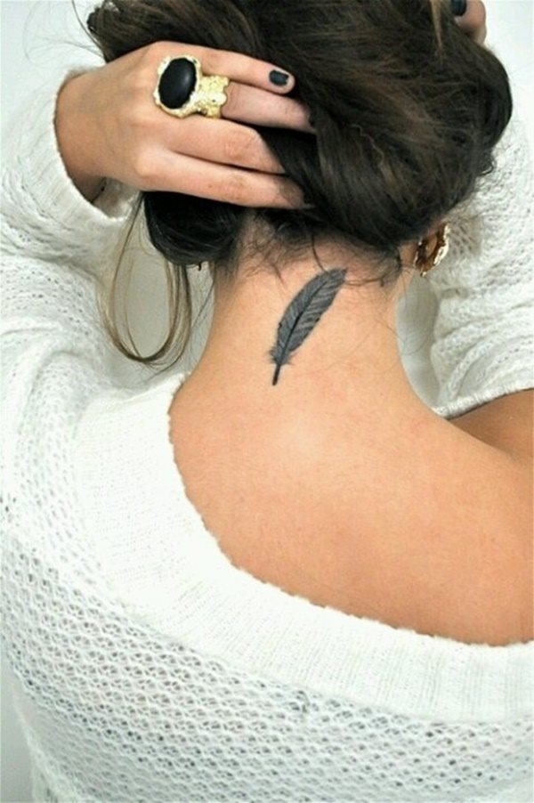 tatouage plume 54