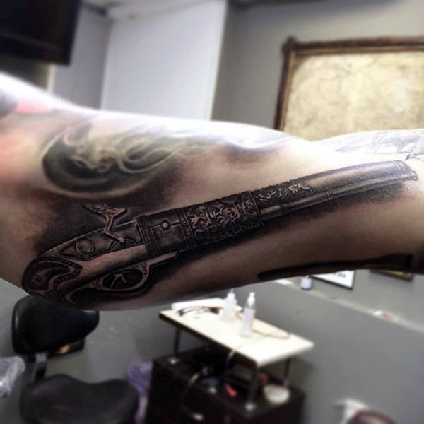 tatuaggio pistola 69