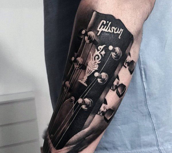 tatuaggio chitarra 69